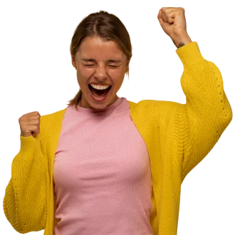 Happy woman raising her arms in victory sign